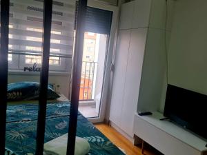 Postel nebo postele na pokoji v ubytování GOMEX studio