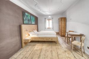 Postel nebo postele na pokoji v ubytování Exclusive Apartment Tassenbacherhof