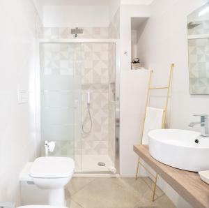 Koupelna v ubytování B&b Spigolerooms + 8 fotografií