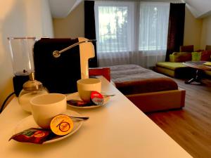 Postel nebo postele na pokoji v ubytování SPA&Hotel MŪSA PARADISE
