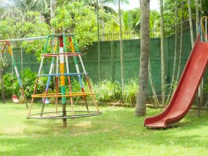 a playground with a slide and a slidesktop at Visaka Hotel - Kataragama in Kataragama