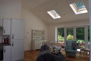 Køkken eller tekøkken på The White House Garden Cottage