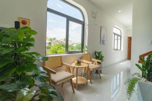 Posezení v ubytování Mint Hoi An Villa