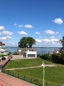 a view of the water from a building at Palstek - Steinhude in Wunstorf