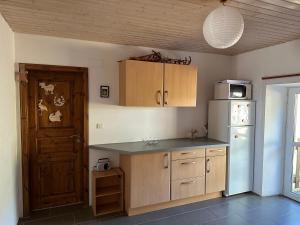 Kuchyň nebo kuchyňský kout v ubytování Vue sur les Montagnes + 16 fotografií