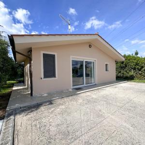 a small house with a roof at Vinciguerra Central House Tuscany in Altopascio
