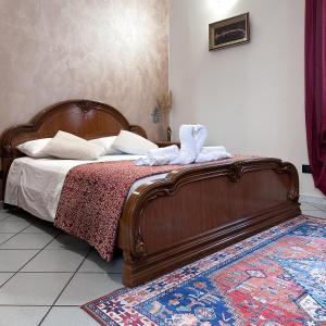 Tempat tidur dalam kamar di Vinciguerra Central House Tuscany