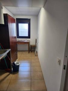 Televizors / izklaižu centrs naktsmītnē El Apartamento