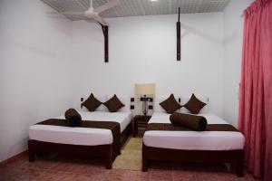 Кровать или кровати в номере The Grand Leisure