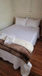 Łóżko lub łóżka w pokoju w obiekcie 4Estações