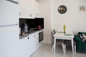 Кухня або міні-кухня у ArtLife apartments (FAUNA)