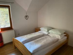 Ένα ή περισσότερα κρεβάτια σε δωμάτιο στο Željo