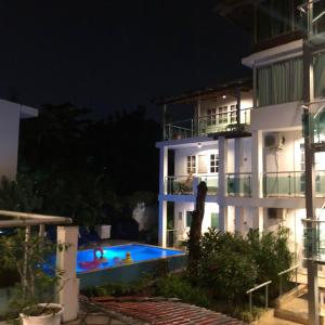 Bazén v ubytování Hotel Neptuno Refugio nebo v jeho okolí