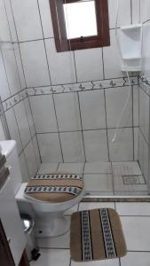 Kúpeľňa v ubytovaní CASA DA FAMÍLIA DE GRAMADO