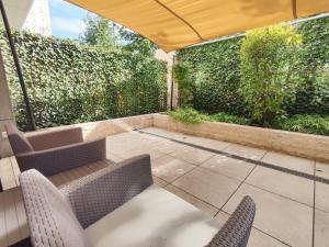 Posedenie v ubytovaní Spa Residence Carbona Mona Lila Apartman + 25 fotografií