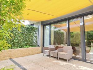 Posedenie v ubytovaní Spa Residence Carbona Mona Lila Apartman