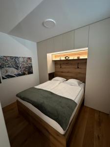 Postel nebo postele na pokoji v ubytování Apartment Deluxe Ossiacher See - Gerlitzen
