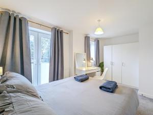 Postel nebo postele na pokoji v ubytování Guest Rooms Near City Centre & Anfield Free Parki