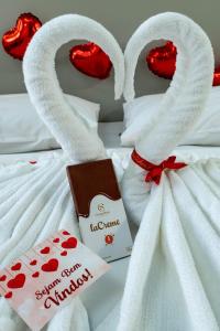 Cama ou camas em um quarto em Nobile Inn Pampulha