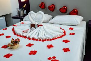 Cama ou camas em um quarto em Nobile Inn Pampulha