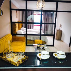 Фотография из галереи Moderne Appartement au plein Centre-Ville en Face Hilton & la Gare de Train TGV avec climatisation в Танжере