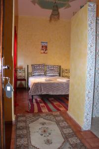 Posteľ alebo postele v izbe v ubytovaní Kasbah lucas