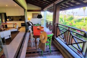 Balkón nebo terasa v ubytování Ykutiba Imbassai H101 - apt vista rio e mar