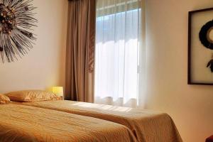 Postel nebo postele na pokoji v ubytování Ykutiba Imbassai H101 - apt vista rio e mar + 56 fotografií