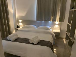 Cama ou camas em um quarto em La Veranda Hotel mais 37 fotos