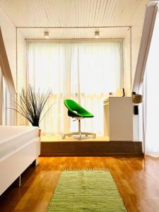 Posezení v ubytování Cozy Hideout - Condo Hotel