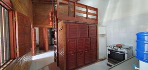 A kitchen or kitchenette at Casa Temporada Guriri Beira-Mar