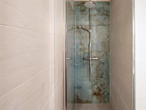 a shower with a glass door in a bathroom at 6 person holiday home in Sollia-By Traum in Brenn