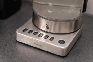 a food processor sitting on top of a counter at Royal Apartment City Center Baden-Baden in Baden-Baden