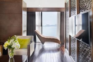 a living room with a view of the water at Cat ba Paradise Hotel - Sky Bar & Massage in Cat Ba