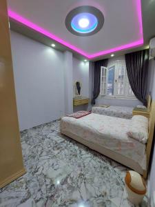 מיטה או מיטות בחדר ב-Oocka stay villas