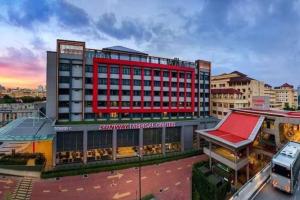 a rendering of a hotel with a red building at S3 2Room Sunway Geo 1-8PAX Sunway Medical Centre in Kampong Penaga