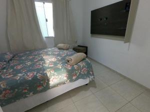 Postel nebo postele na pokoji v ubytování TerraTemporada Casa de Praia de Alto Padrão + 31 fotografií