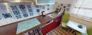 a kitchen with a sink and a counter top at Monteurunterkunft Haus Onsti in Albstadt