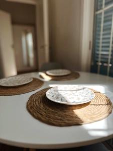 a table with three plates on top of it at Rococo in Montevideo