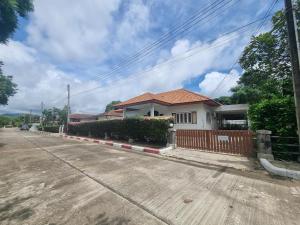 a house on the side of a road at Mae Rampung Beach House Pool Villa in Rayong