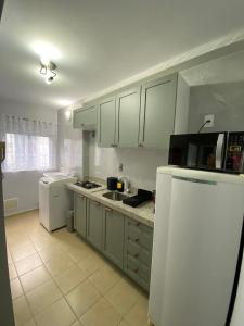 Dapur atau dapur kecil di Excelente ap. 2 dorm.p/ viagens à trabalho ou lazer