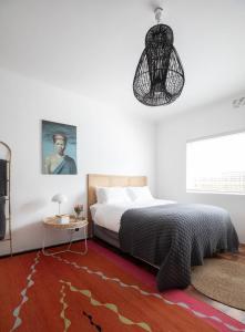 Ένα ή περισσότερα κρεβάτια σε δωμάτιο στο Boho,Muizenberg