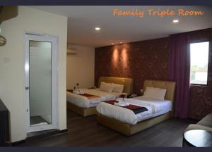 Postel nebo postele na pokoji v ubytování I Garden Hotel + 37 fotografií