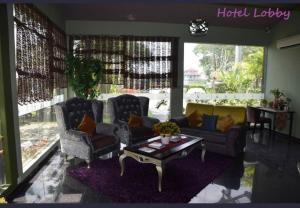 Posezení v ubytování I Garden Hotel