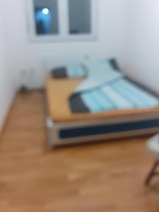 a blurry picture of a bed in a room at Dunav in Smederevo
