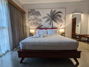 Prasanthi Hotel客房内的一张或多张床位