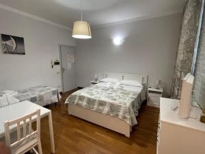 Postel nebo postele na pokoji v ubytování Rooms & Breakfast La Filigrana