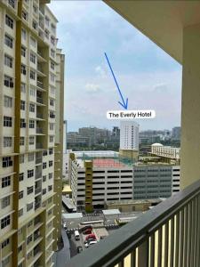 a view of the equity hotel from the balcony of a building at The Celery Homestay @PPAM Saderi - Cozy&Homey in Putrajaya