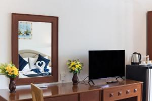 TV a/nebo společenská místnost v ubytování Bevans Place Karon