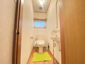 Koupelna v ubytování 島の宿　結んちゅ + 3 fotografie